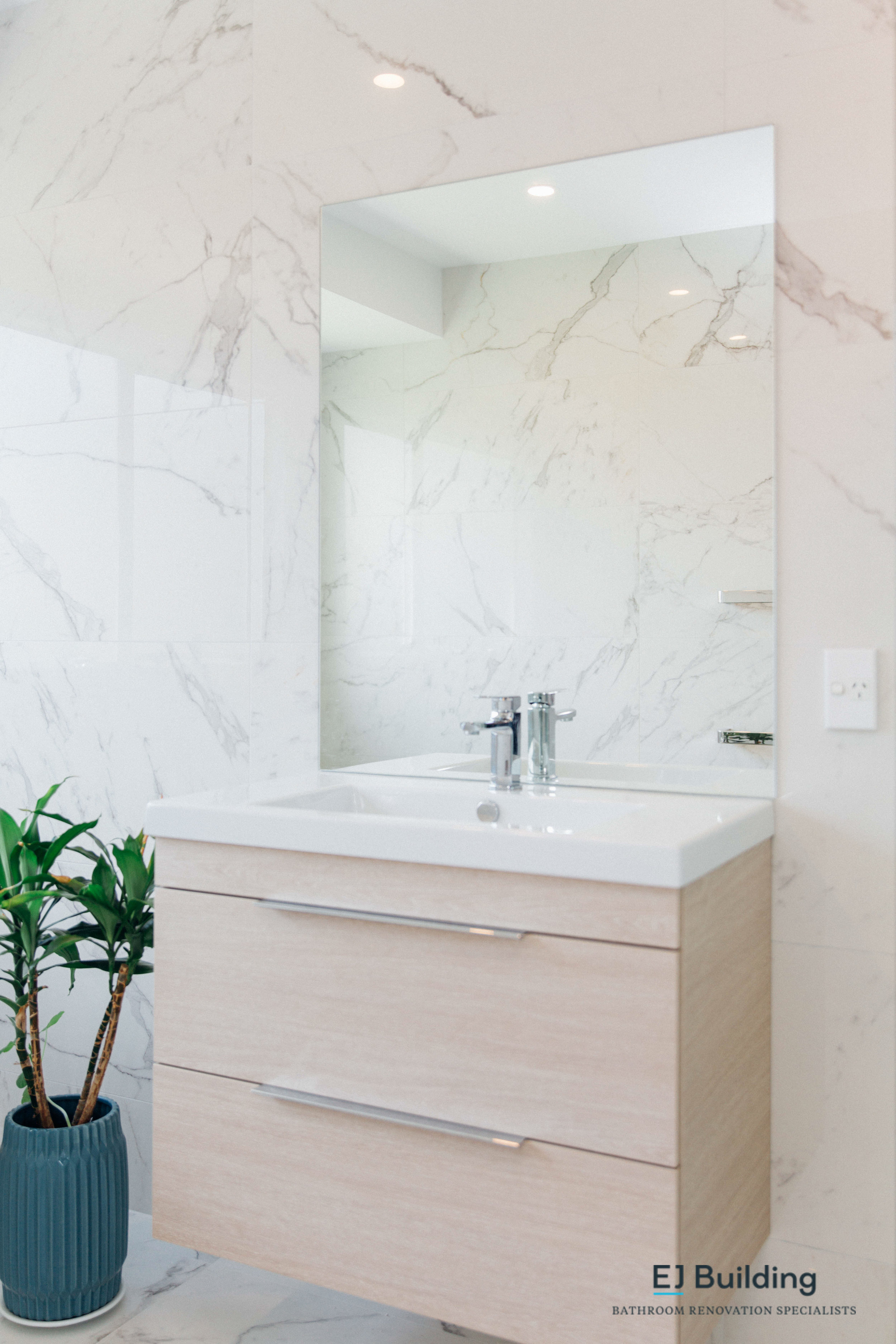 Timber bathroom wall hung vanity.
