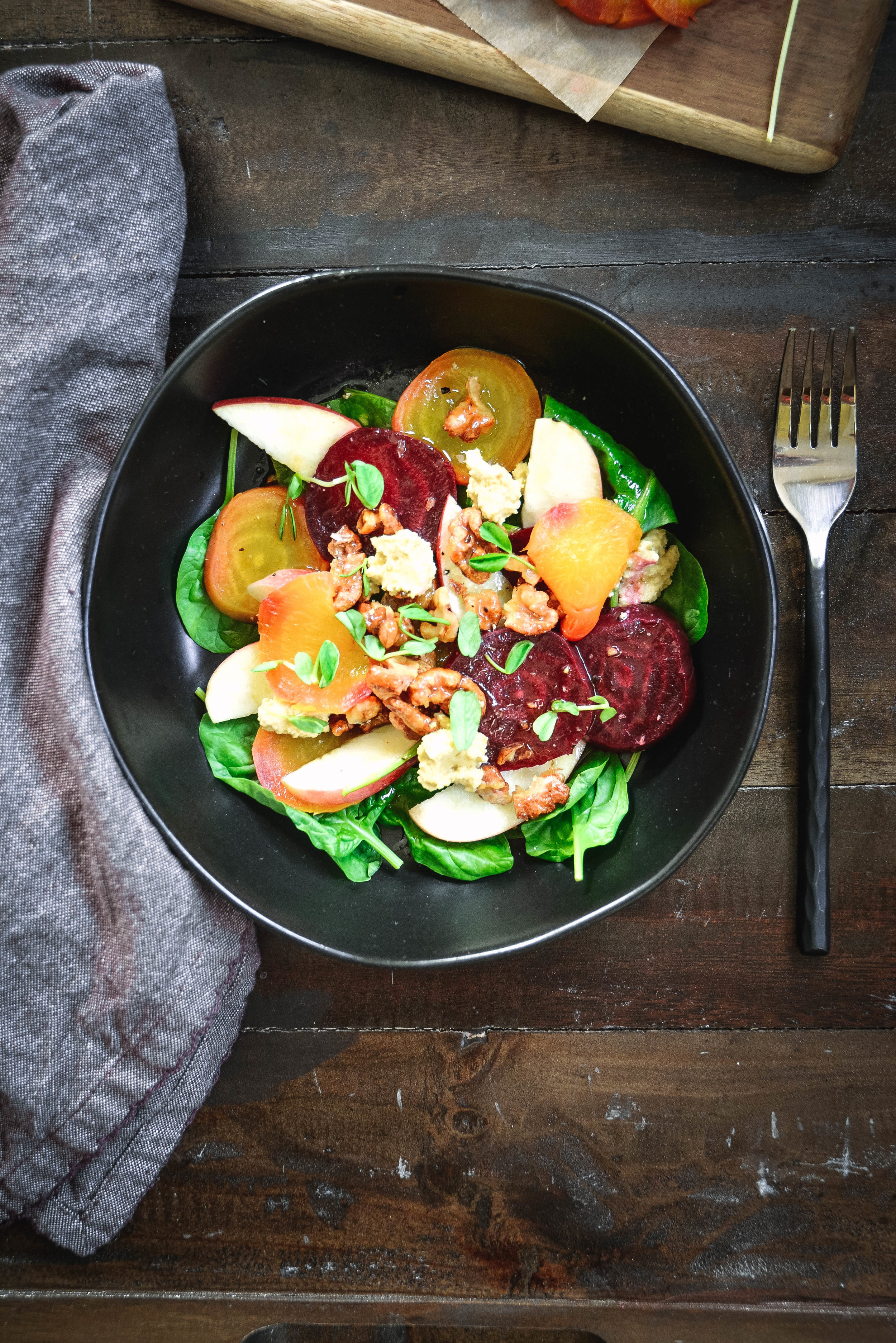  Make your tastebuds happy with this delicious and hearty roasted beet salad with apple, candied walnuts and cashew cheese. It's a fantastic combination that won't disappoint. If you're whole 30, you can still make this by simply using regular walnuts instead of candied. #salad, #fall, #beets, #apple, #calmeats, #vegan, #cashewcheese, #paleo, #whole30, #realfood, #glutenfree, #dairyfree, #dairyfreecheese, #paleocheese 