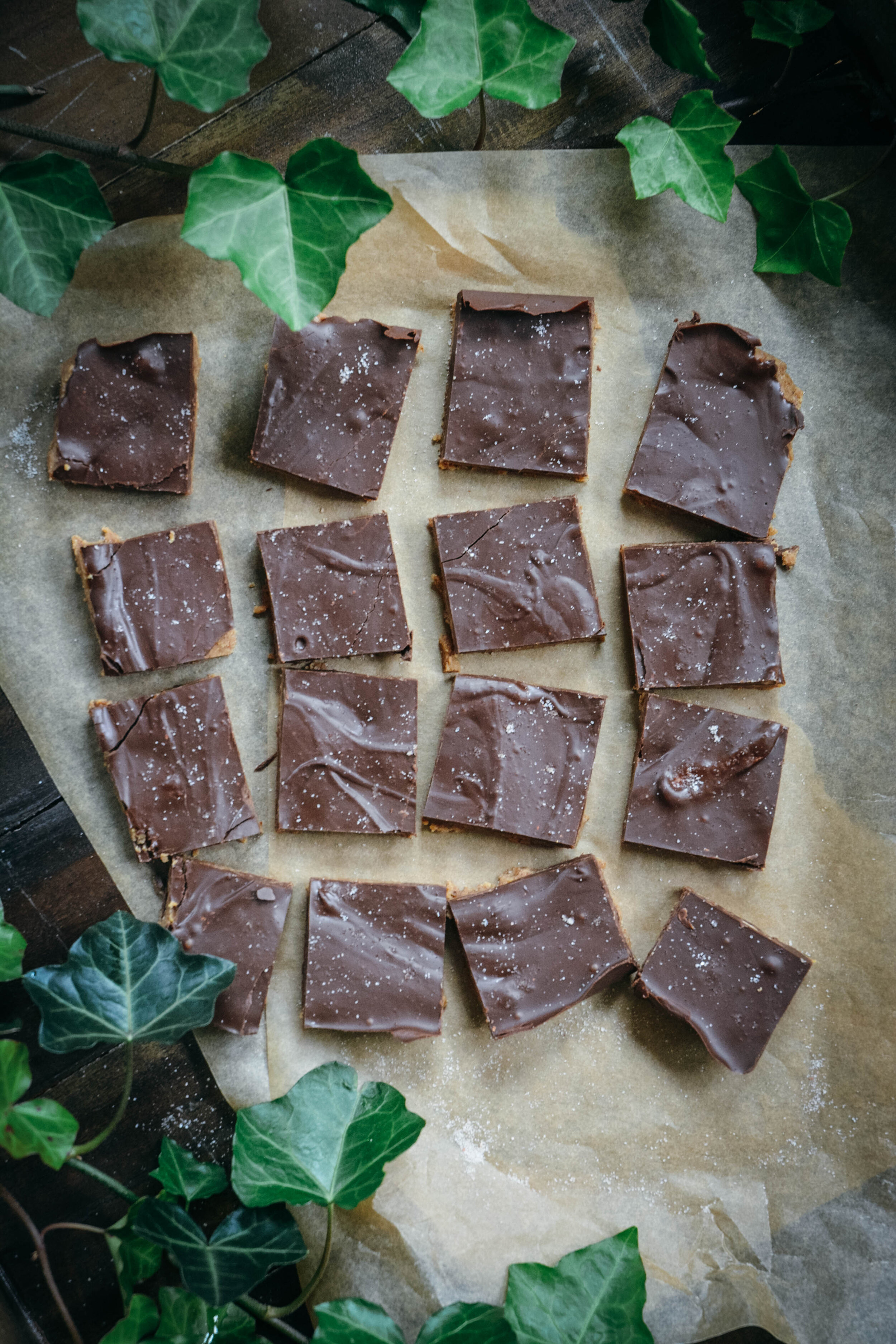 Chocolate almond butter bars with parchment paper