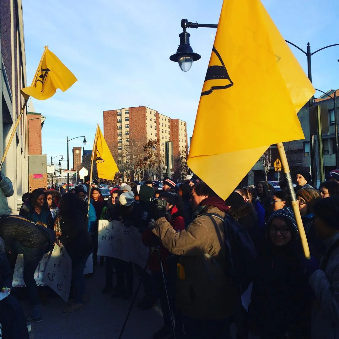 crowd-holding-providence-student-union-flags-rally-outside-school-department.jpg
