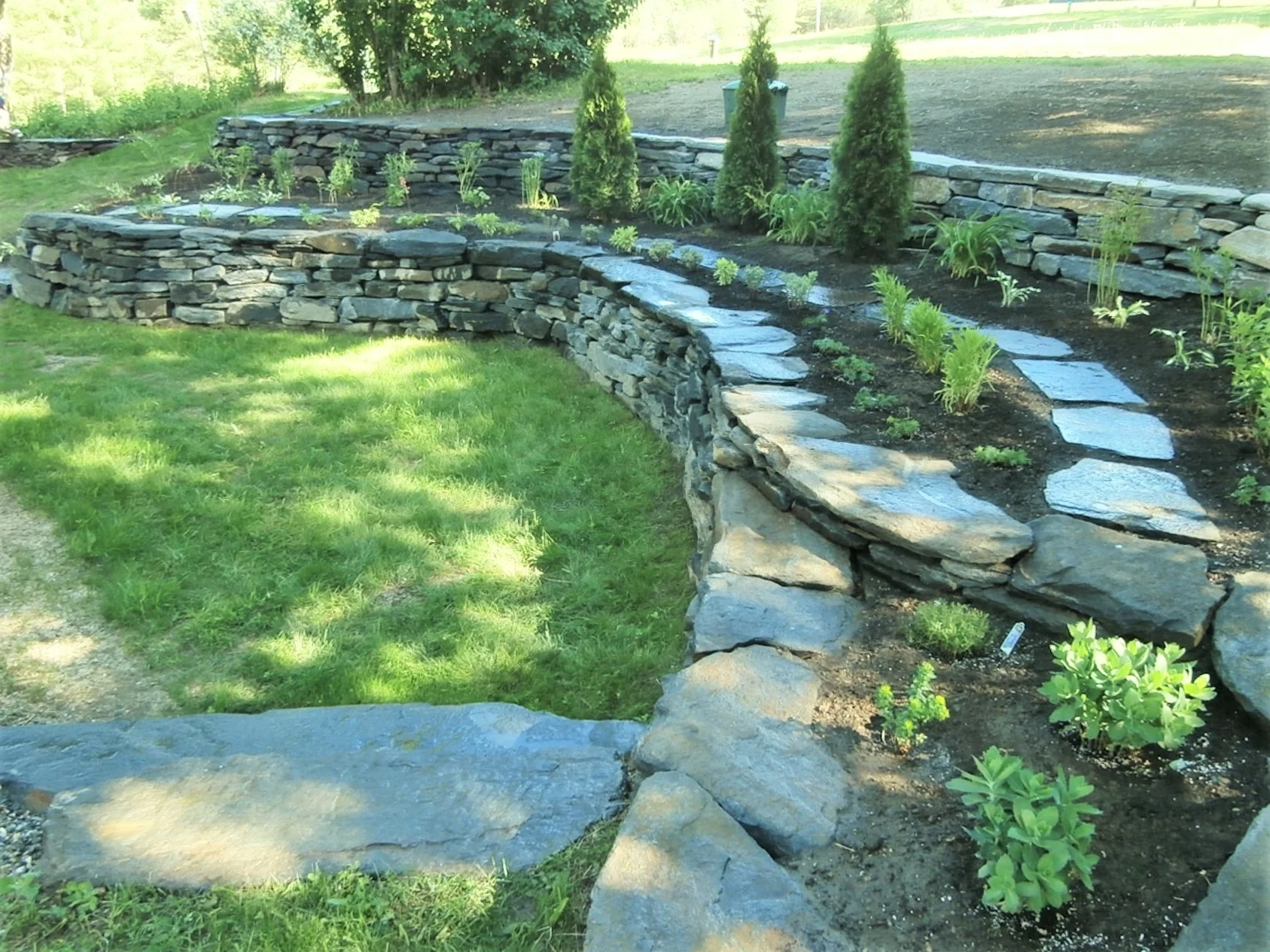 Terraced walls and garden pathway