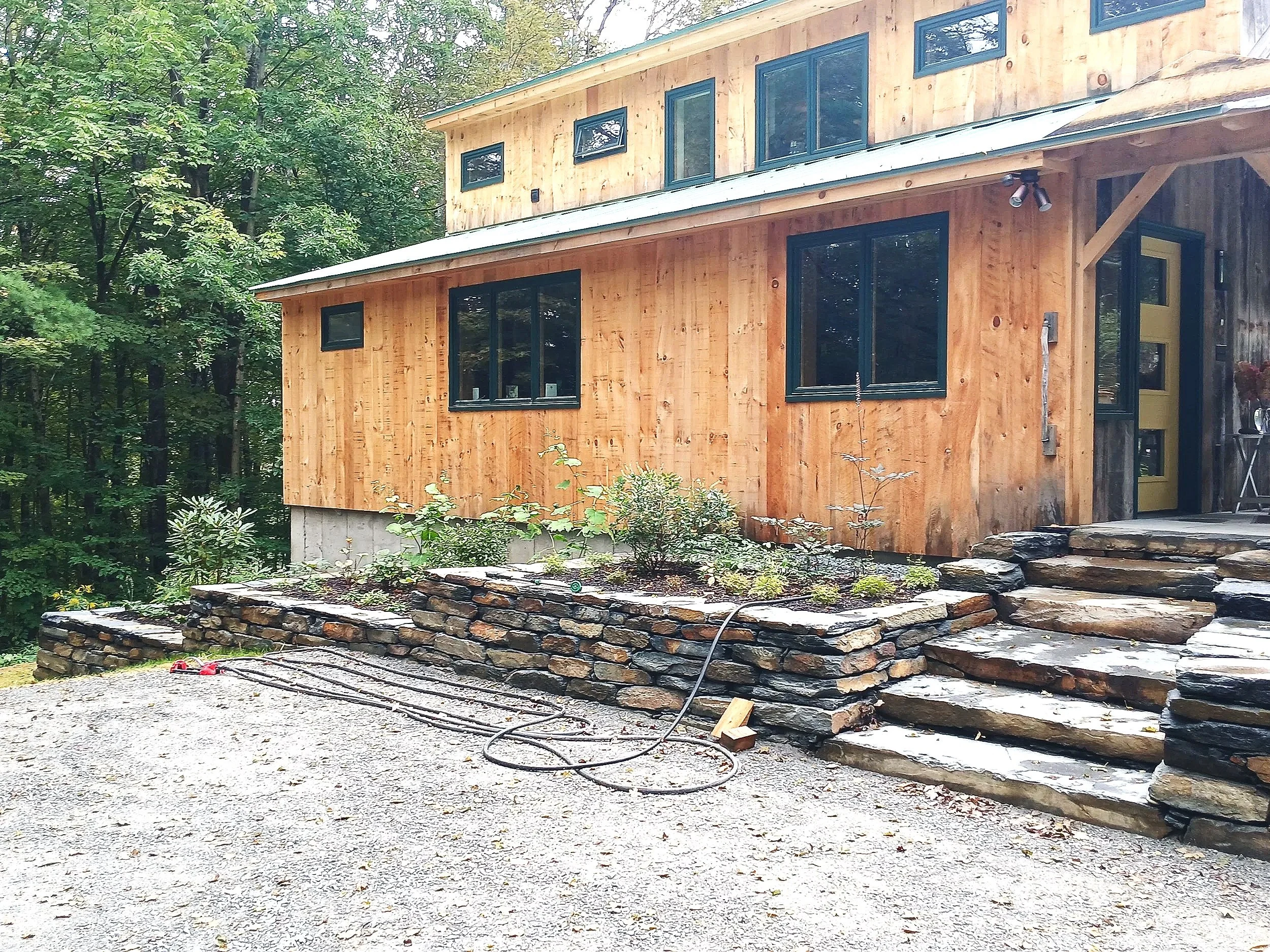Tiered stone retaining walls