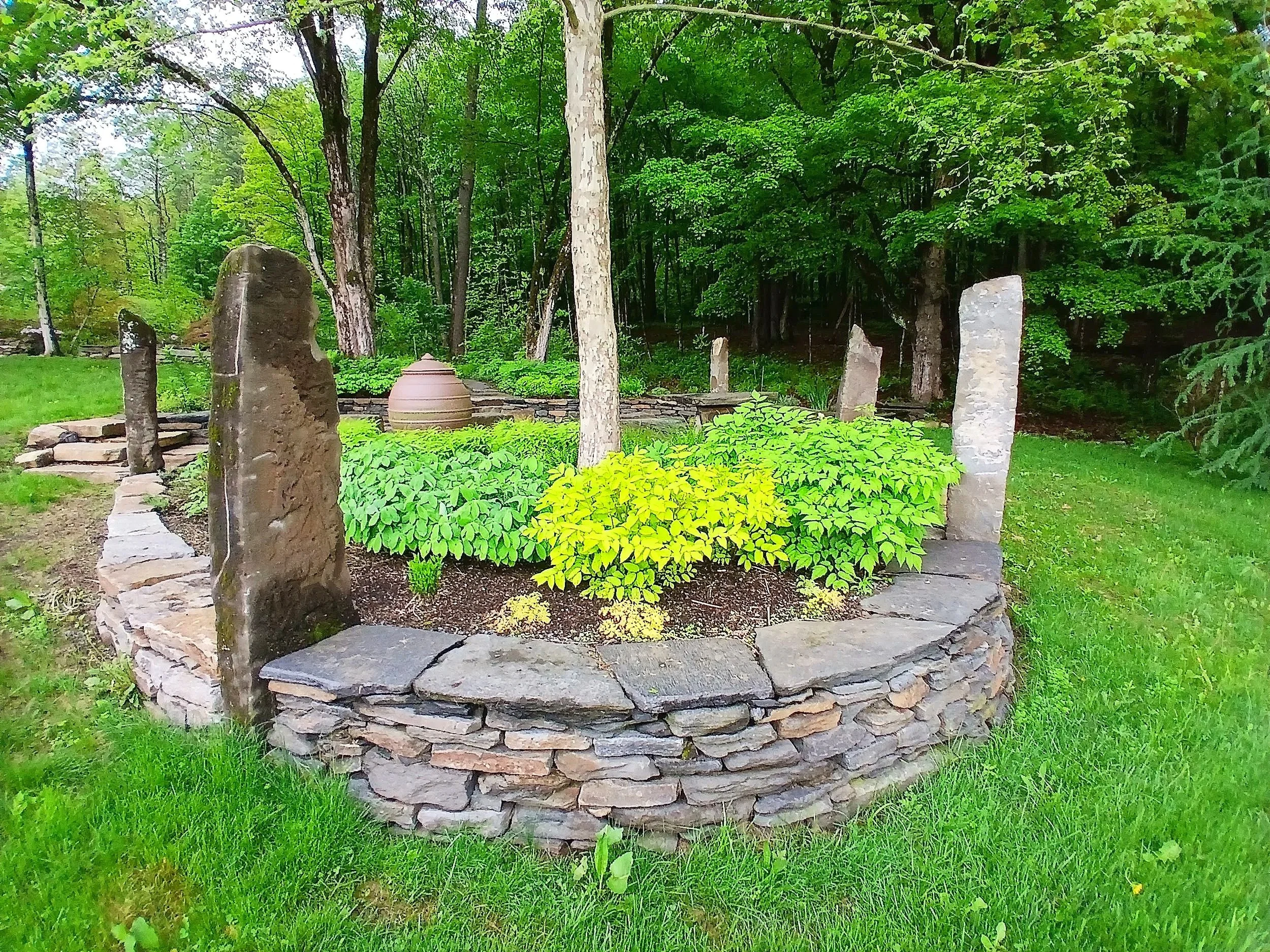 Natural curving stone walls and pillars 