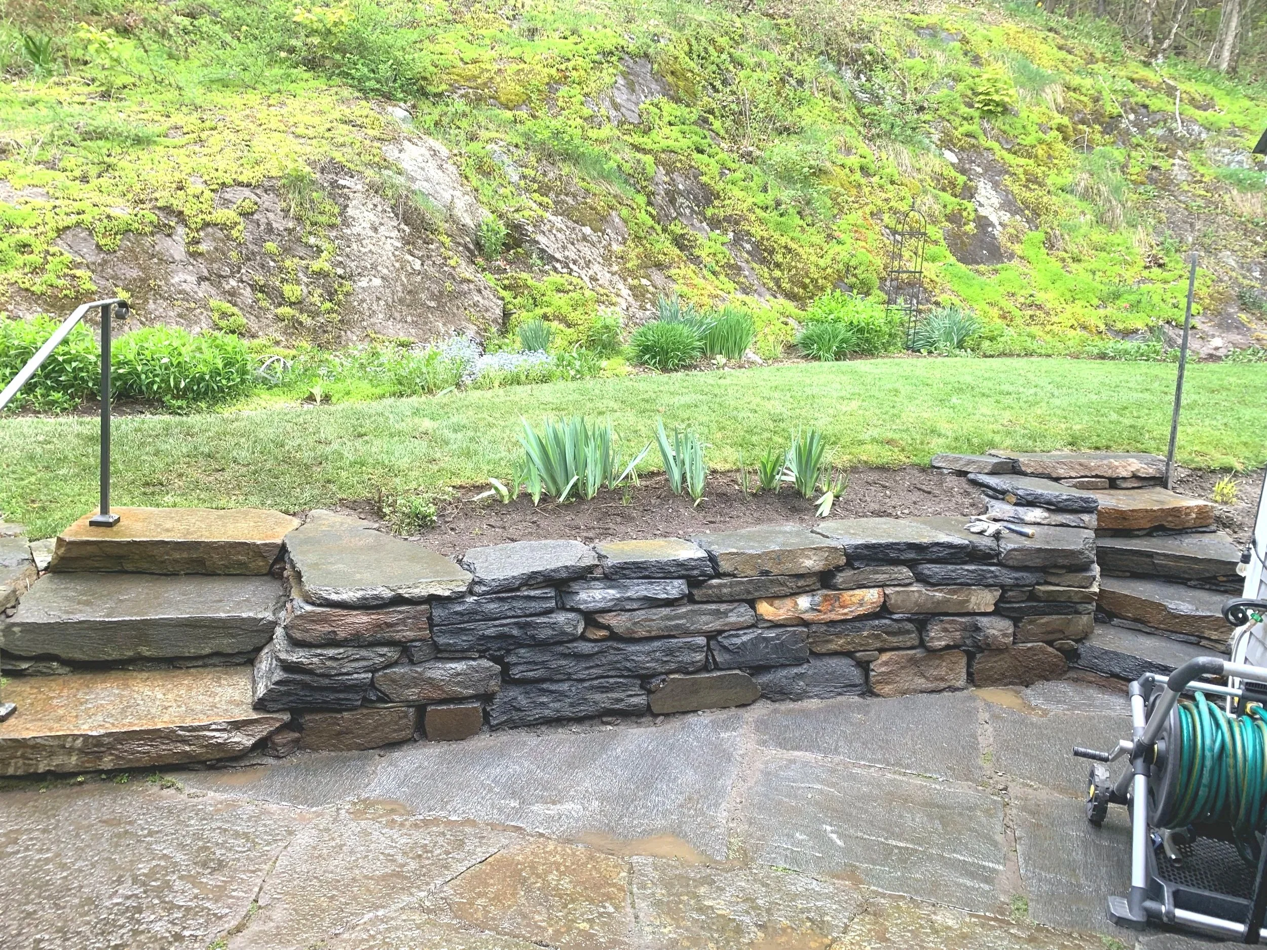 Pocket retaining wall and stone steps