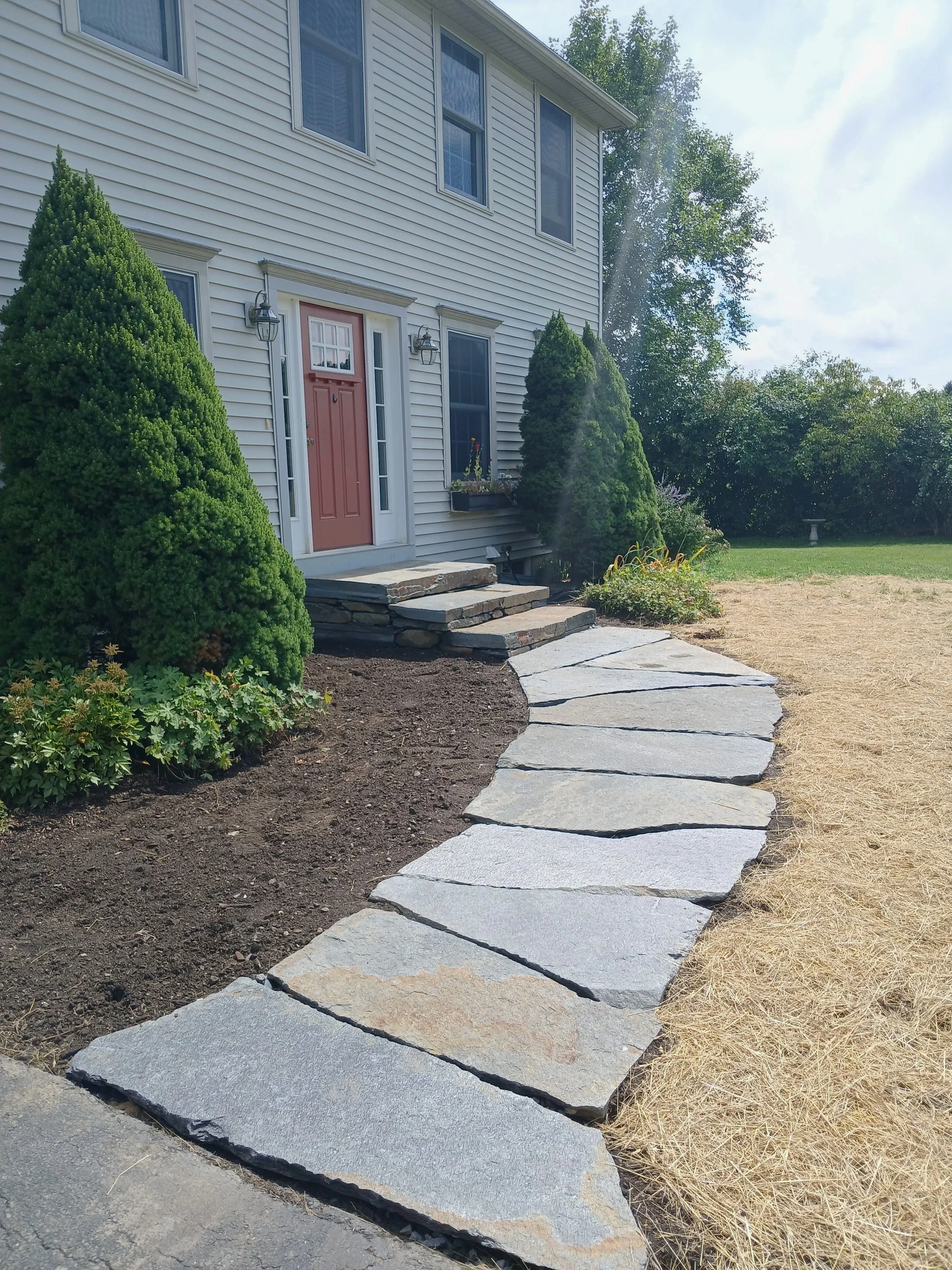 Curving front entrance walkway 