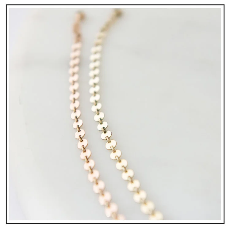 Small Disc Choker Chain_Framed.jpeg