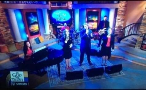 Cara playing the piano in Cornerstone TV's Jubilee Band.