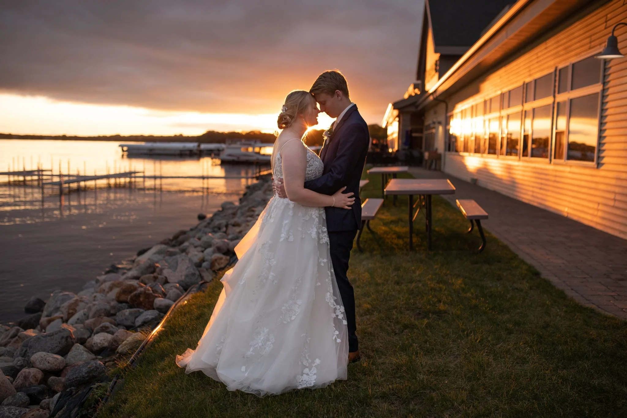 I did not think we'd get a sunset the night of their wedding... but the most amazing sun and colors popped for a whole five minutes so we could get shots like this!