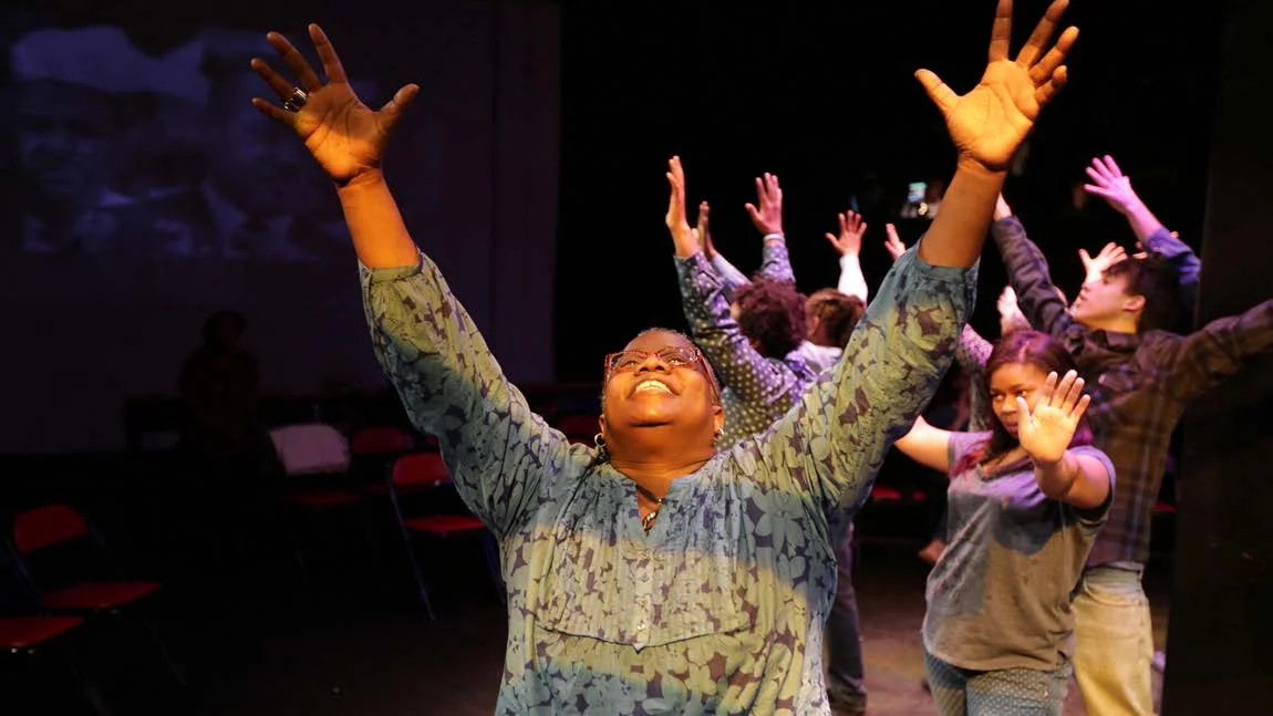 Sheryl Williams leads the community cast of Demonstration 2013 by Dan Friedman, directed by David Nackman at the Castillo Theatre, February 2013. (Photo by Ronald L. Glassman)