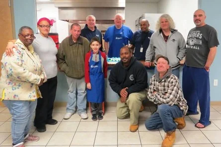 Guests, staff, and volunteers celebrate Joseph's House anniversary at 555 Atlantic Avenue on January 21, 2016.