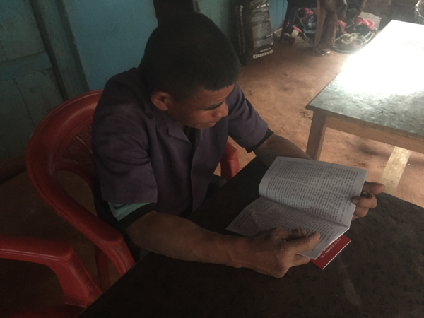 He is reading John in Chheda Bazaar.JPG
