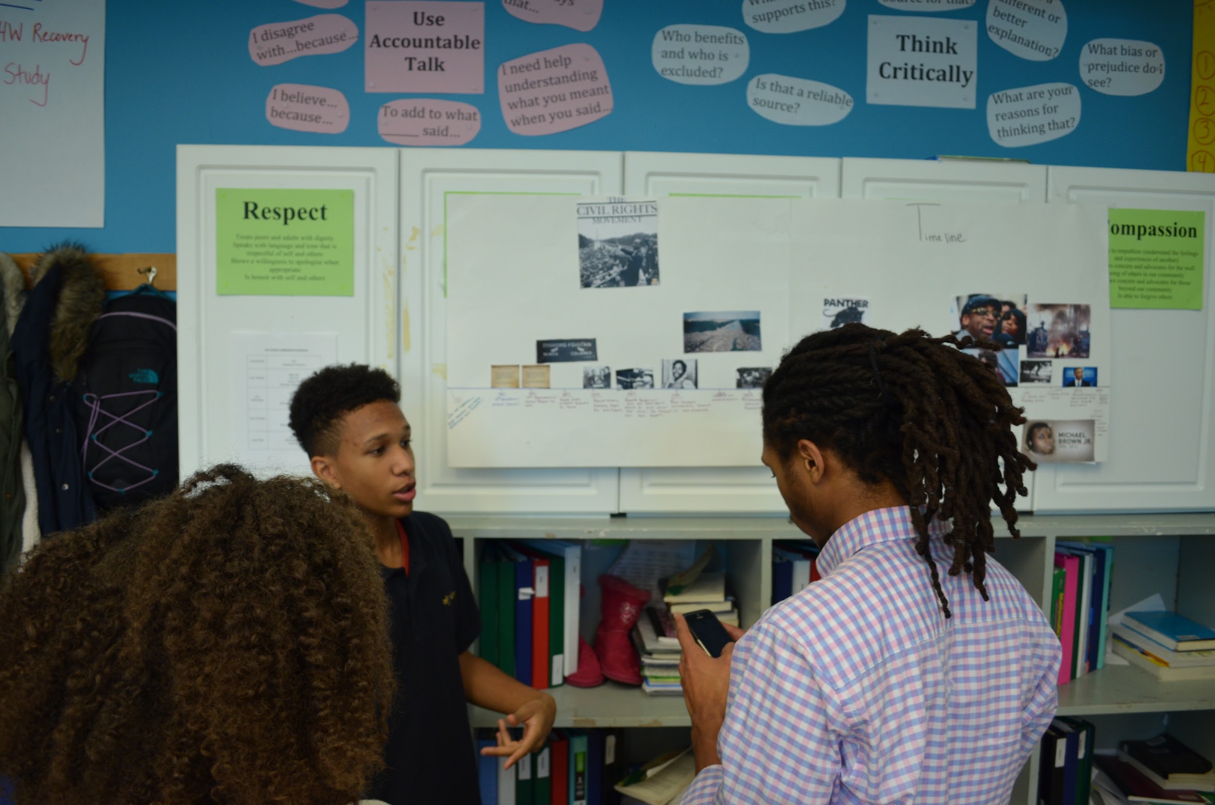 Eddie explaining his timeline to teachers