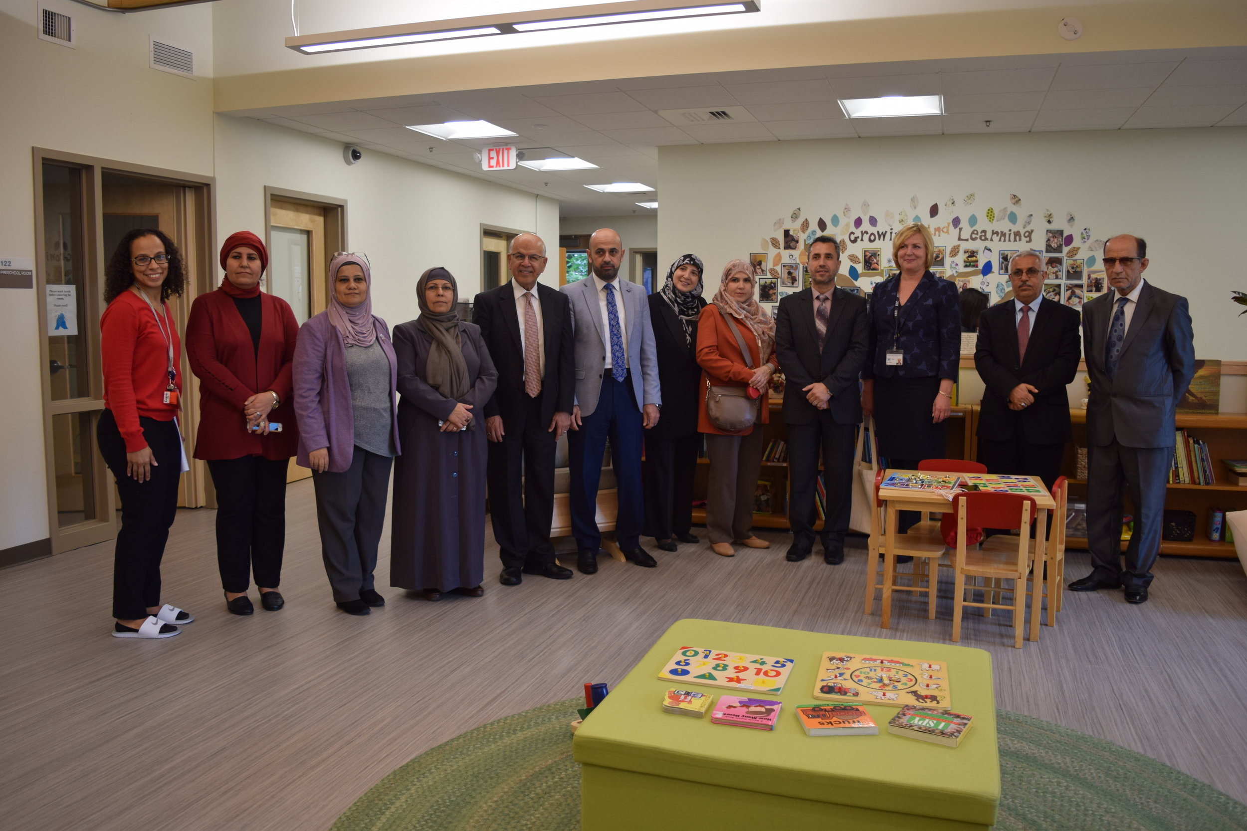 Michelle Sanchez with members of the Iraqi delegation