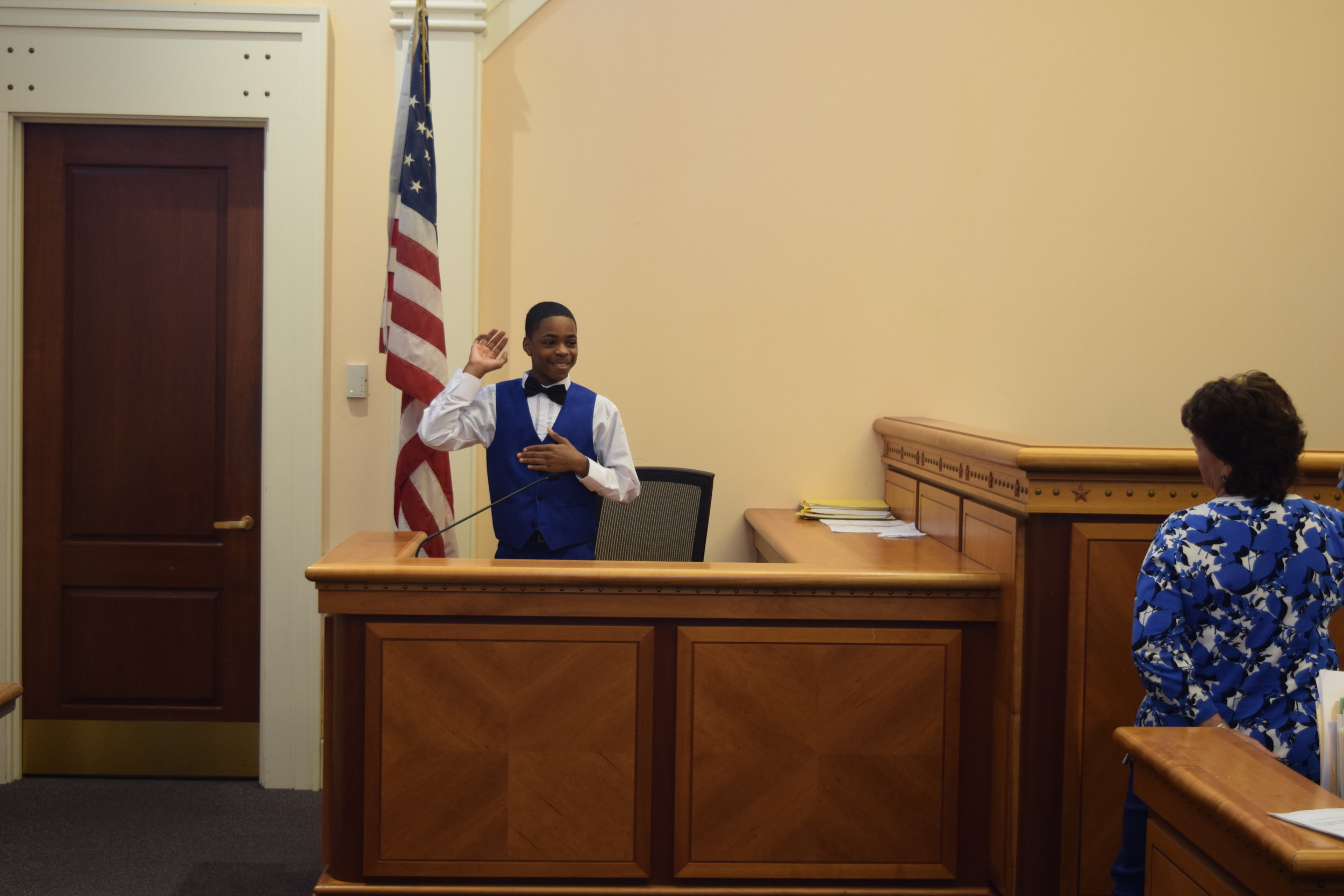   Takari being sworn in     