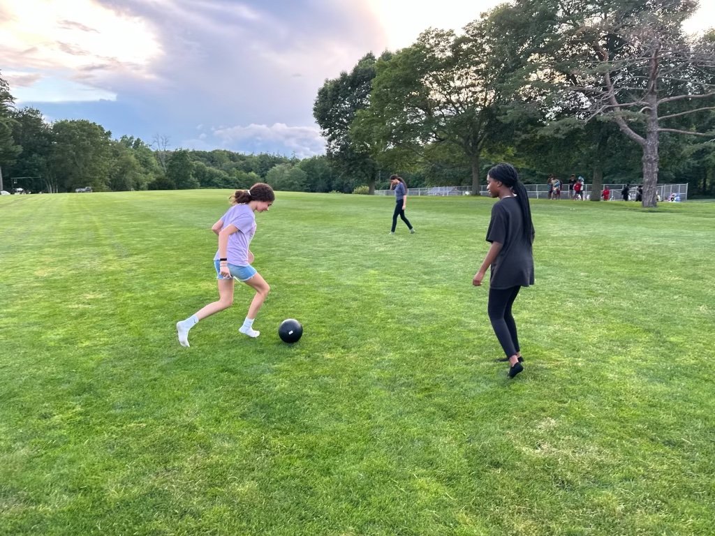  Isabella and Zackiya playing soccer! 