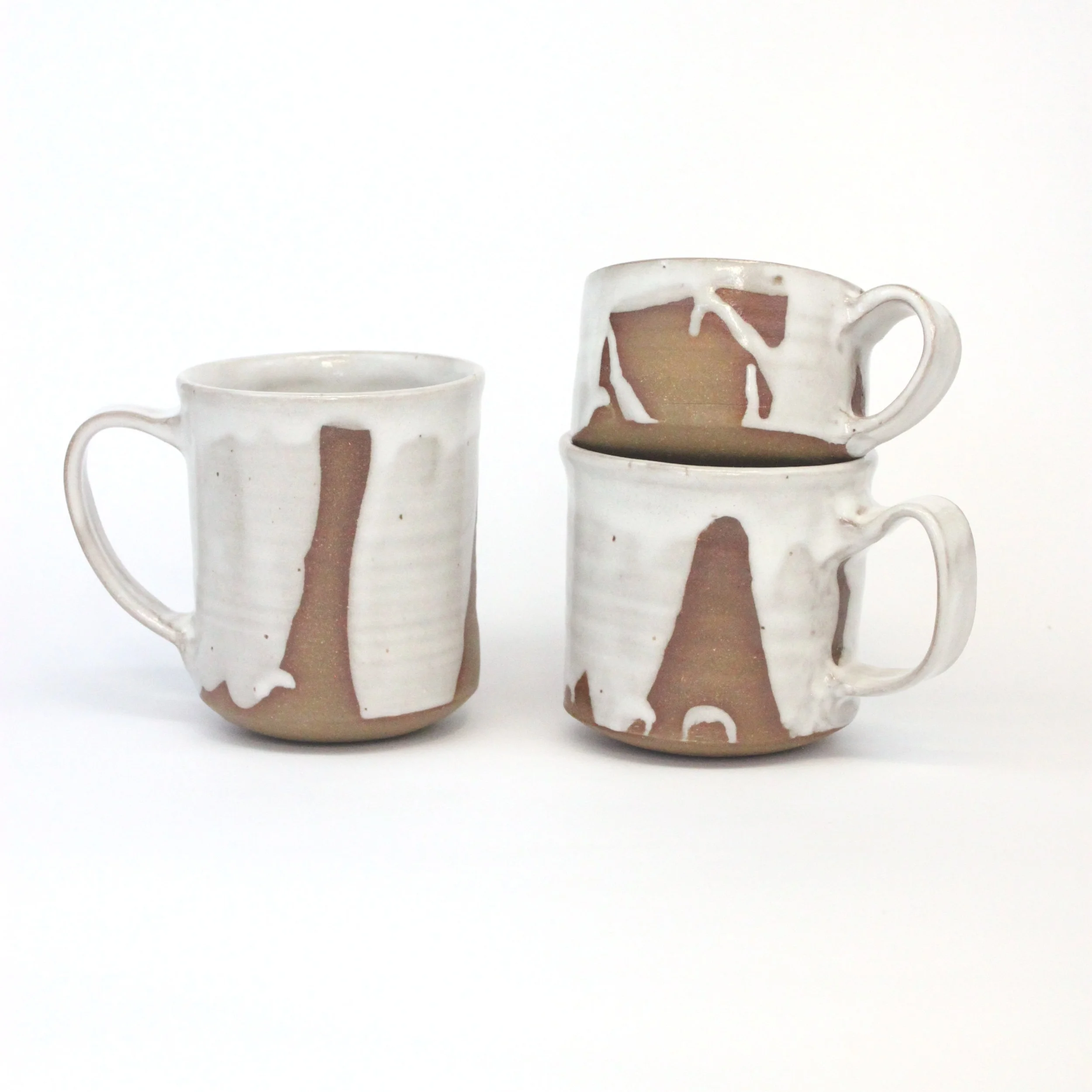 Emergence Mugs