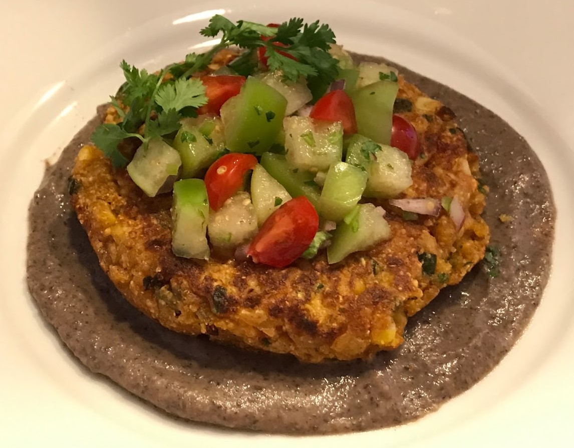 Poblano Corn Cake on Black Bean Corn Sauce with Tomatillo Salsa