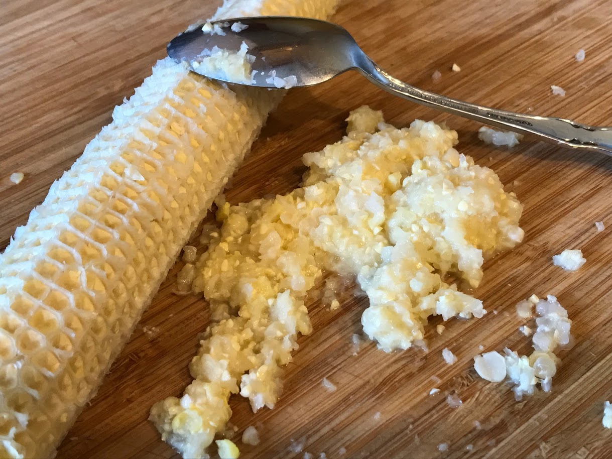 Corn pulp scraped from cob after kernels have been cut off.