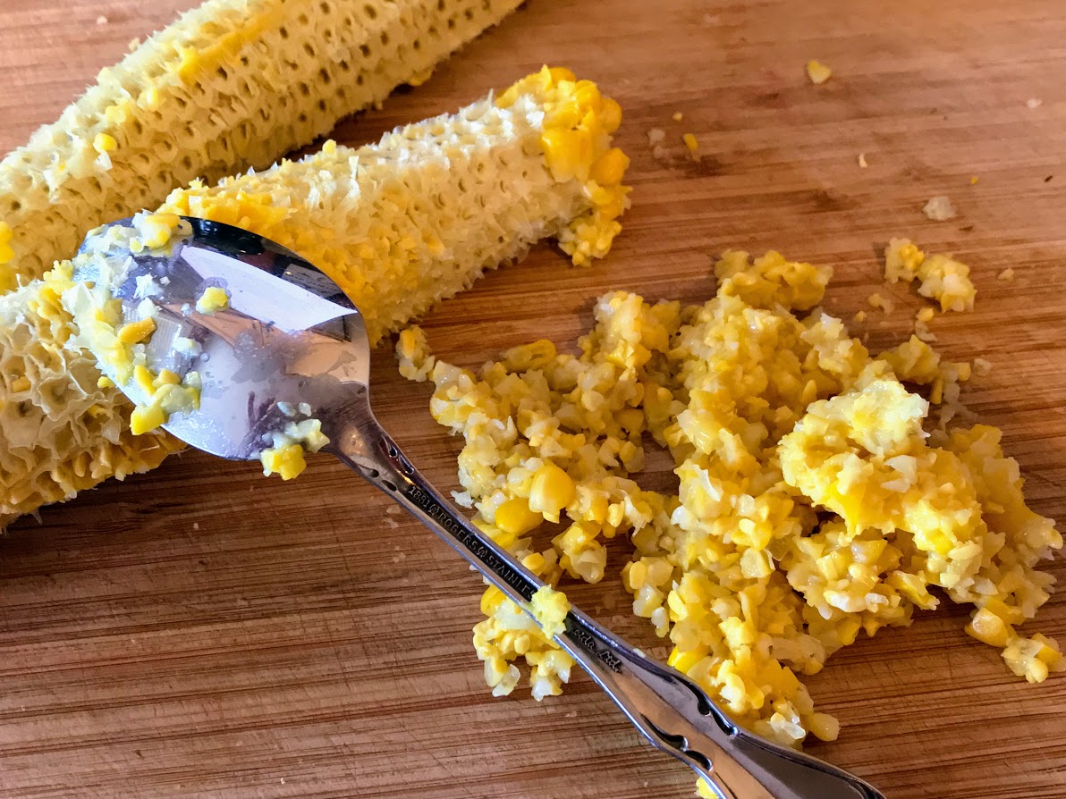 scrape pulp from cob