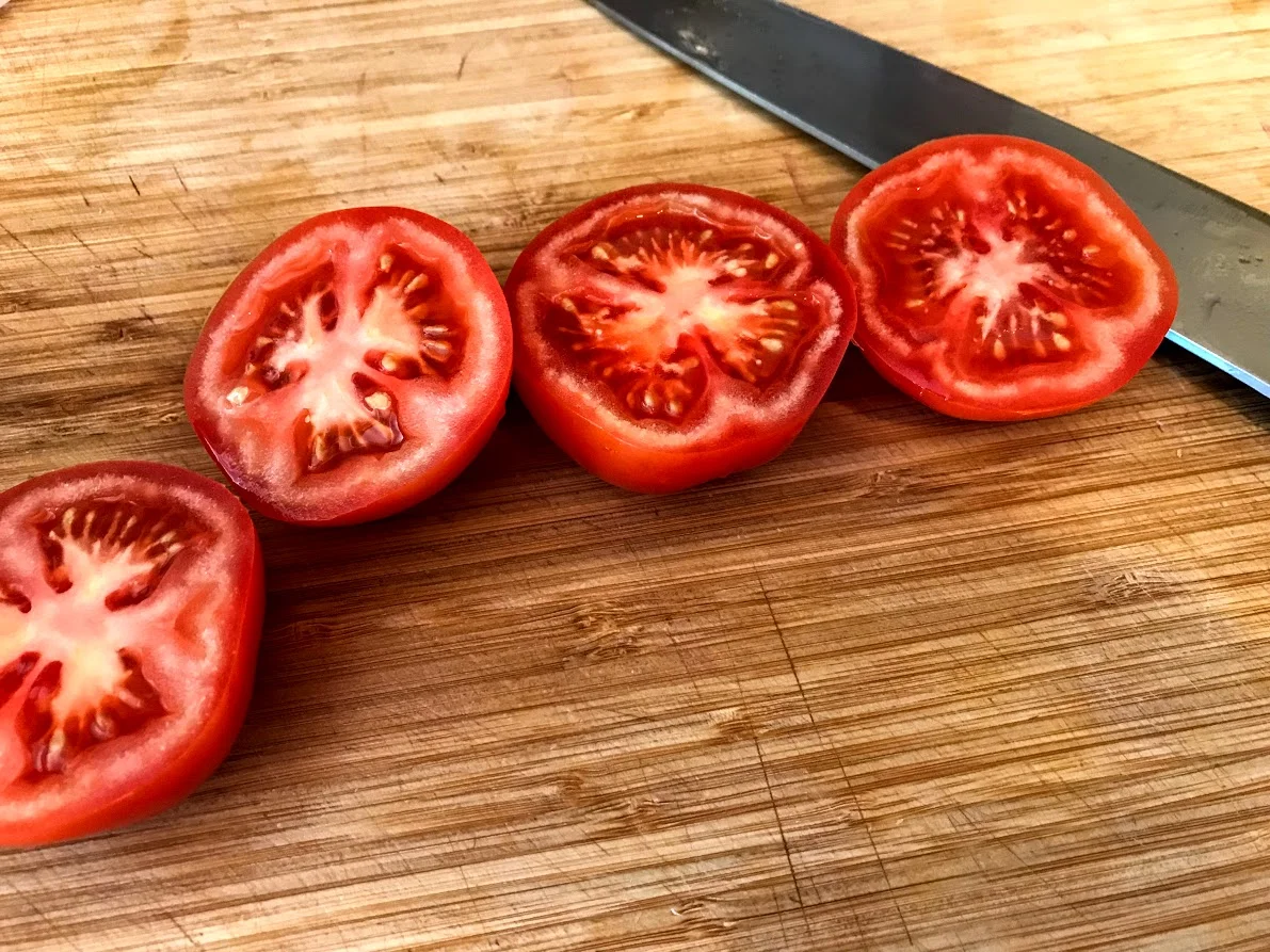 The seeds are full of umami (savory) flavor. No need to discard them.