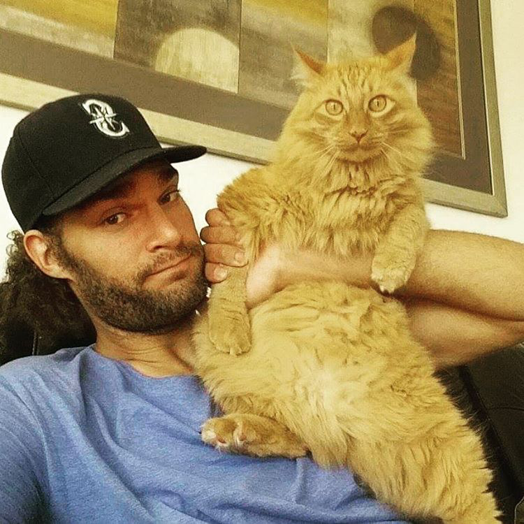 Prince Edward the cat with owner Robin Lopez / Image Credit: ESPN