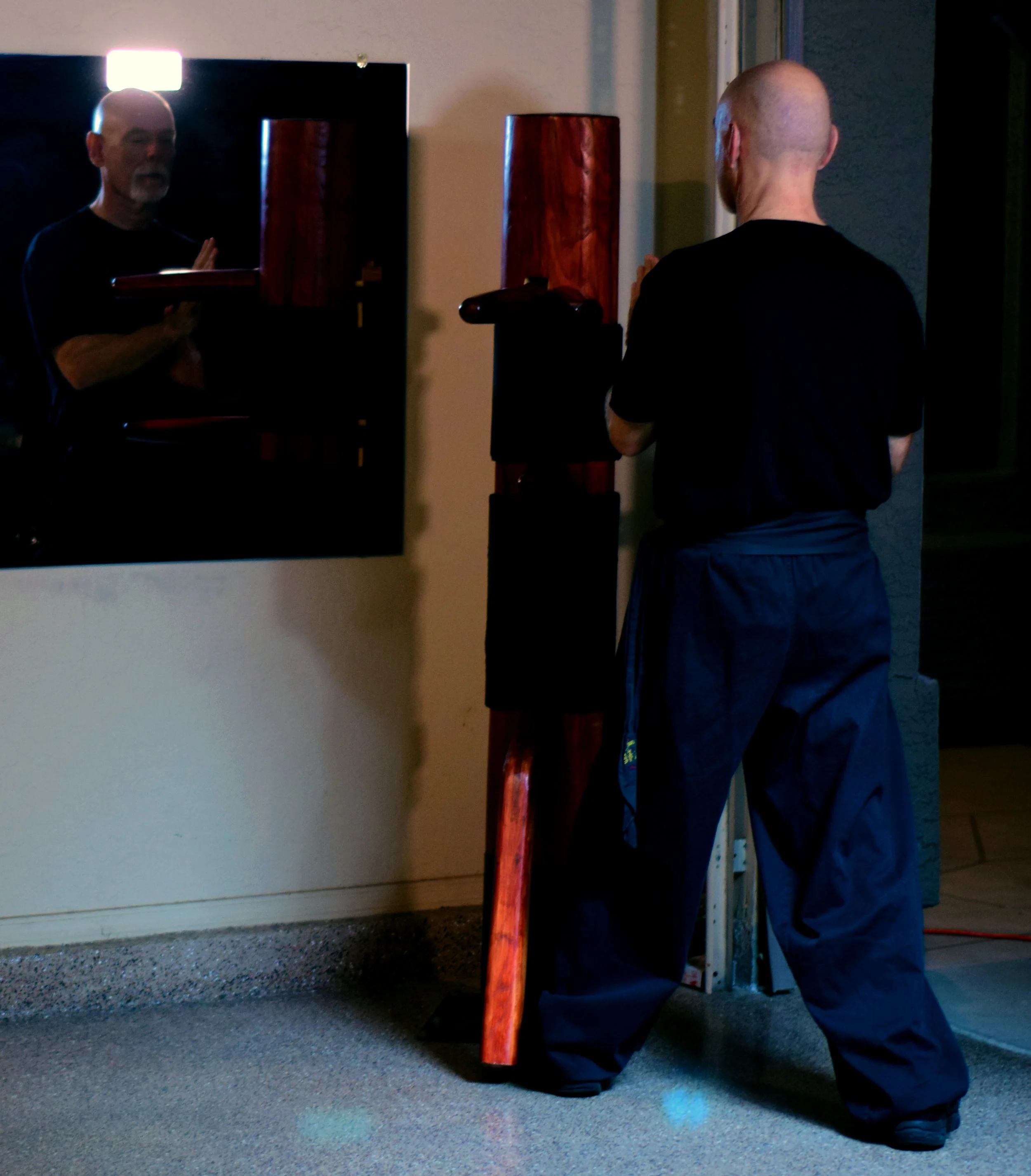 Putting your Siu Lim Tao & Chum Kiu Level together on the Wooden Dummy. This is where you'll learn to flow attacks together as well as turning on and off your power.