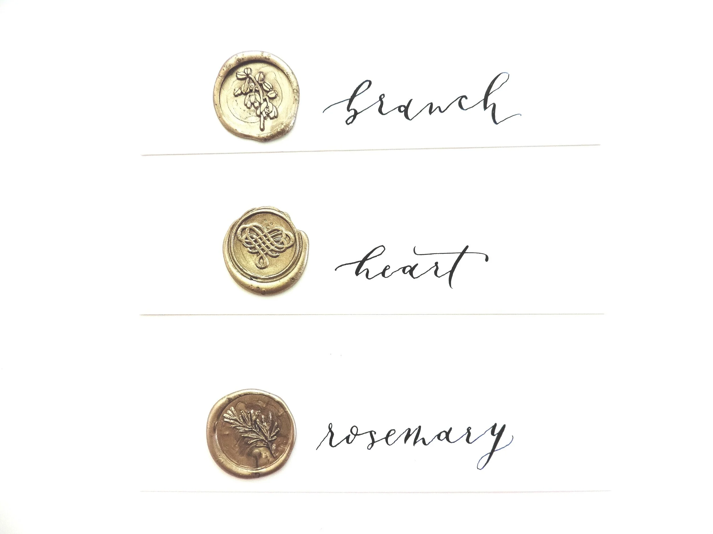 Wax seals are the perfect finishing touch. Your envelopes will be sealed with wax in a color and design that complements your suite. Studio Colors - Copper | Antique Gold | Champagne Gold | Champagne Rose | White Stamp Designs - Branch | Heart | Rosemary