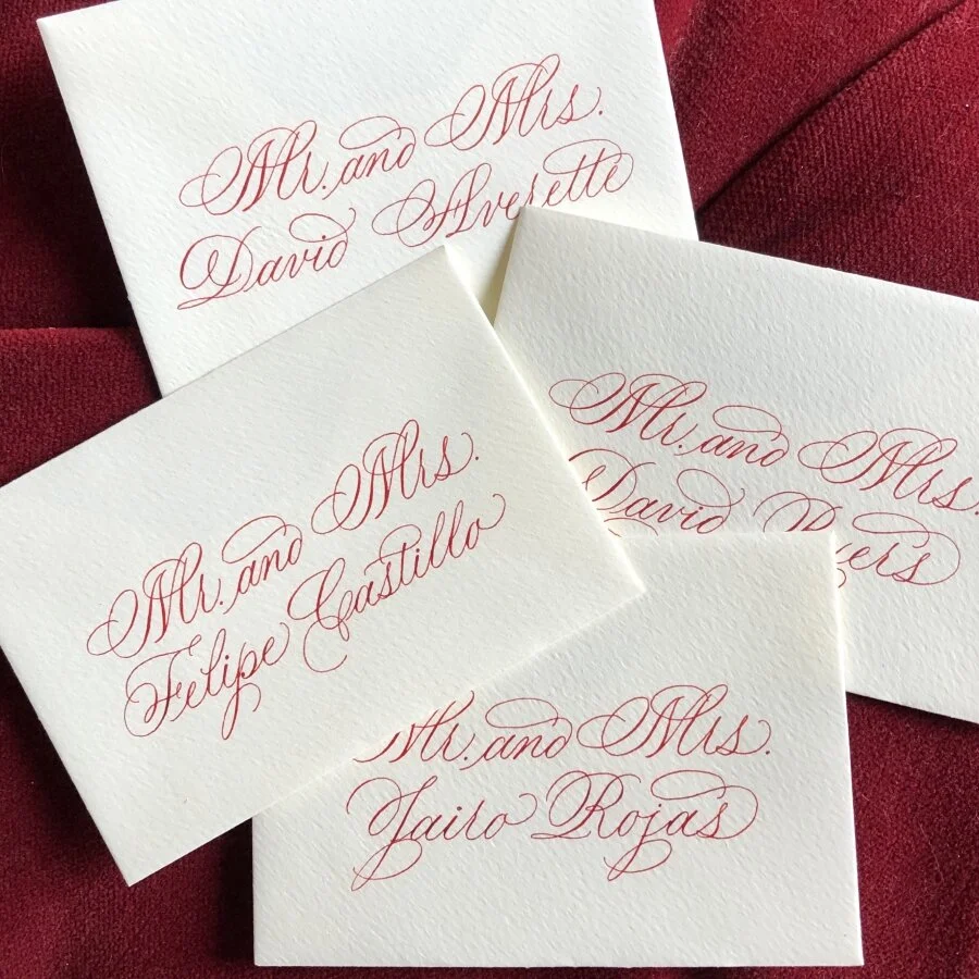 Red Marie Script Calligraphy Escort Cards.jpg