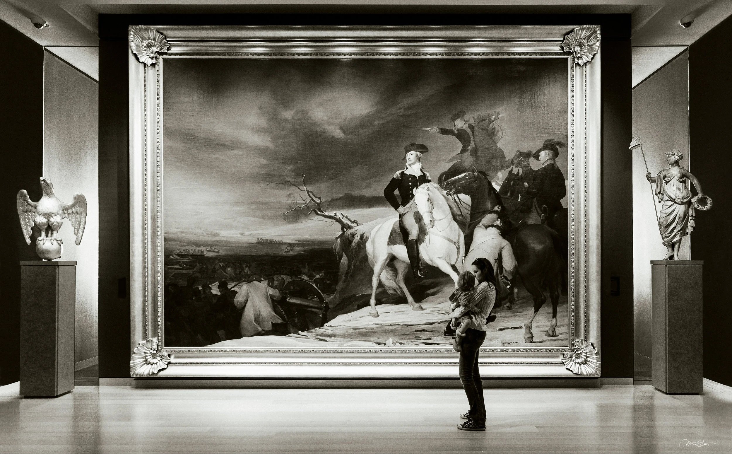 Young mother with child admiring Washington