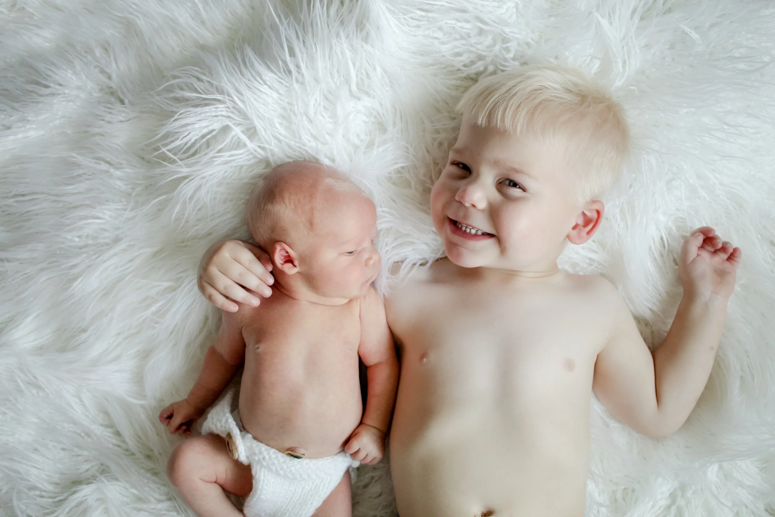 I even was able to sneak a photo of him with his older brother, Bennett. Bennett is a proud big brother and loves Jaxon dearly. During this photo session he came home from daycare and immediately went to Jaxon to say "hi brother" and gave him a kiss. What a sweetie! 