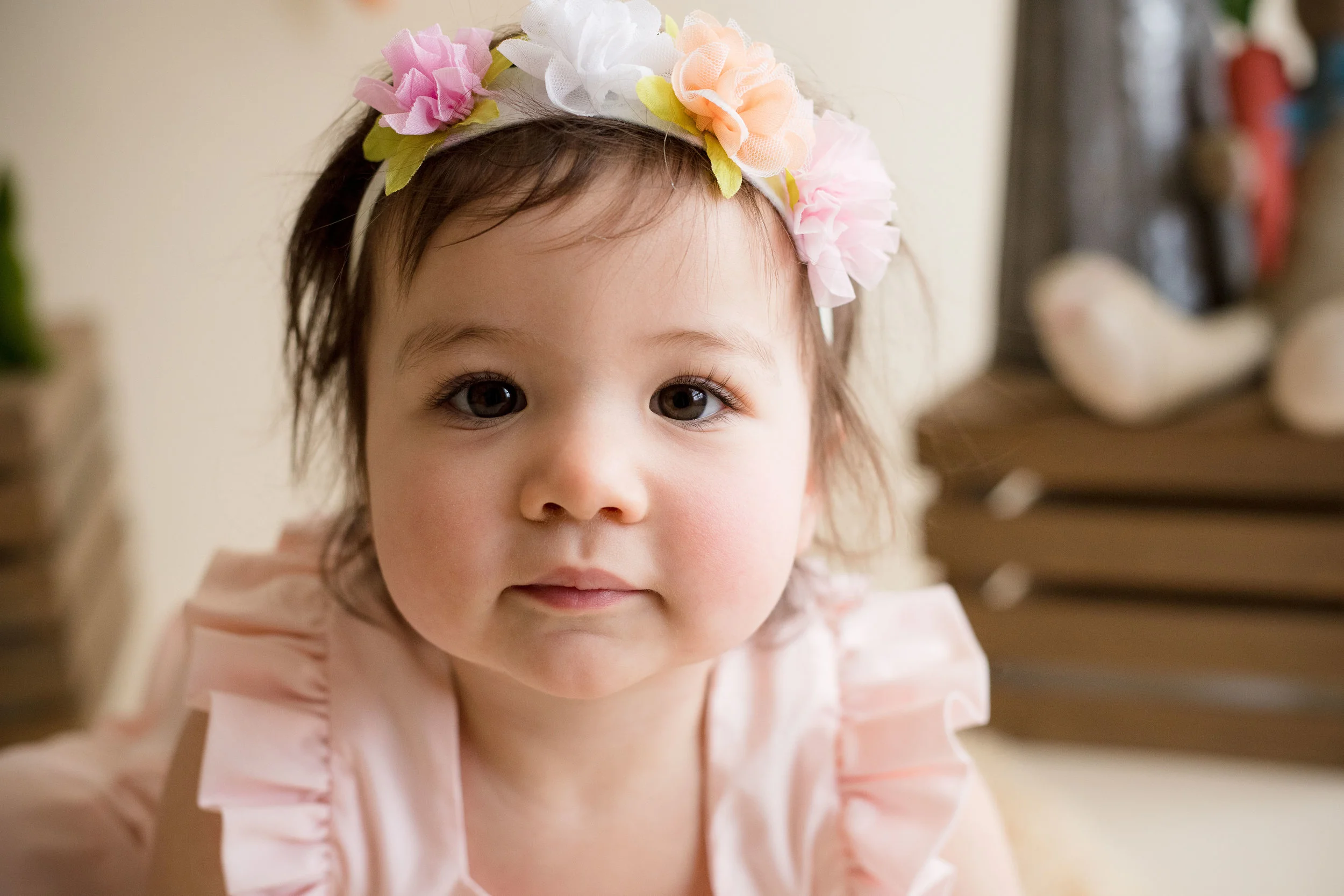 Close up photo of a one year old girl. 