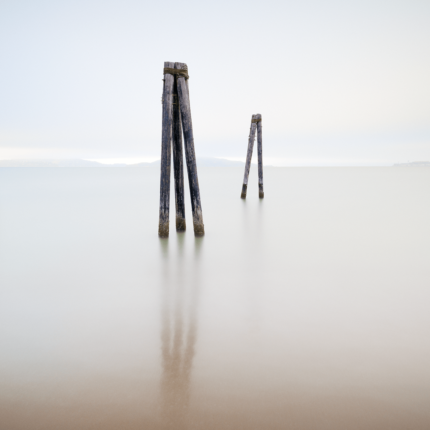 fog-city-san-francisco-bay-pillars-smooth-waters.png