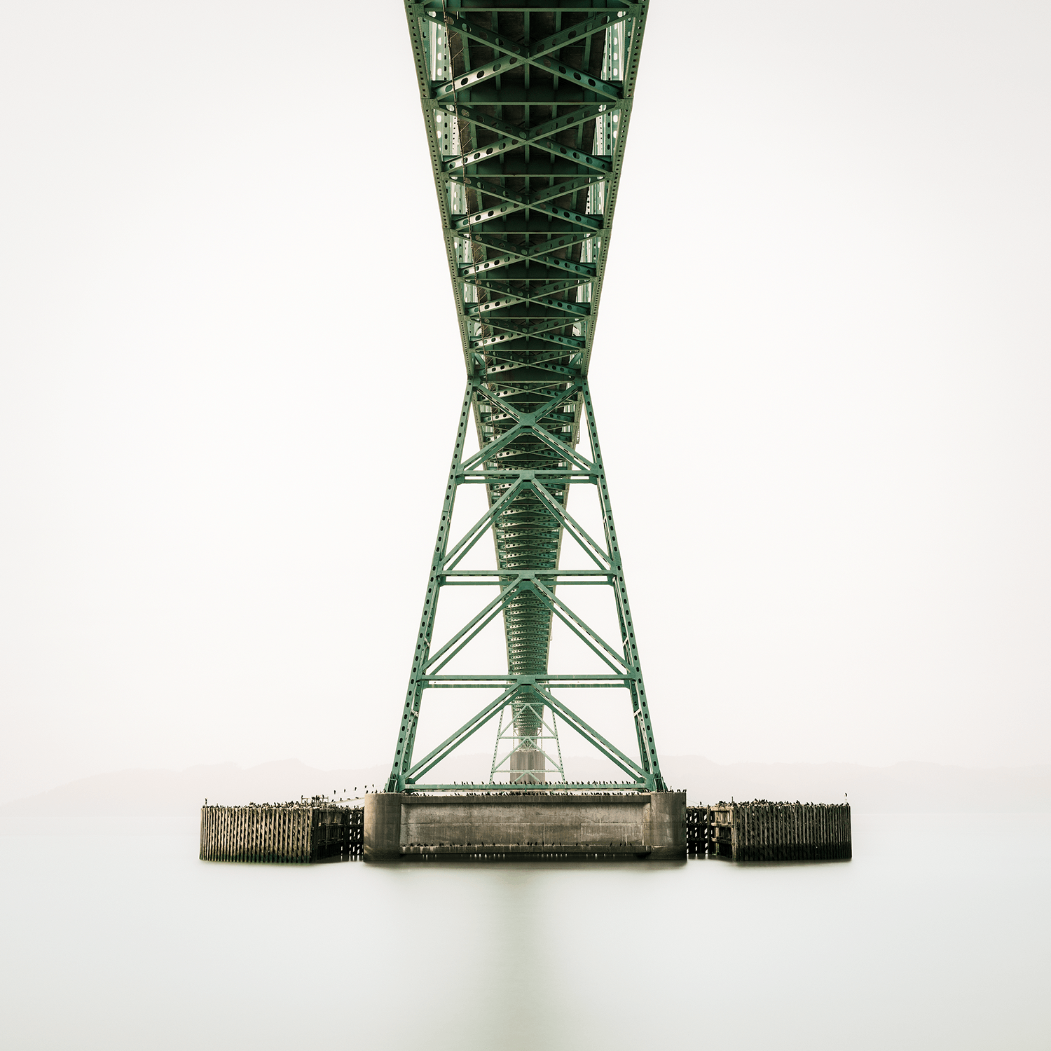 stillness-speaks-green-bridge-smooth-waters.png