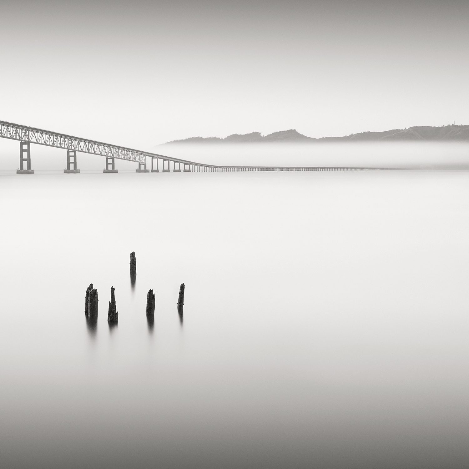 space-solitude-poles-smooth-waters-bridge.png