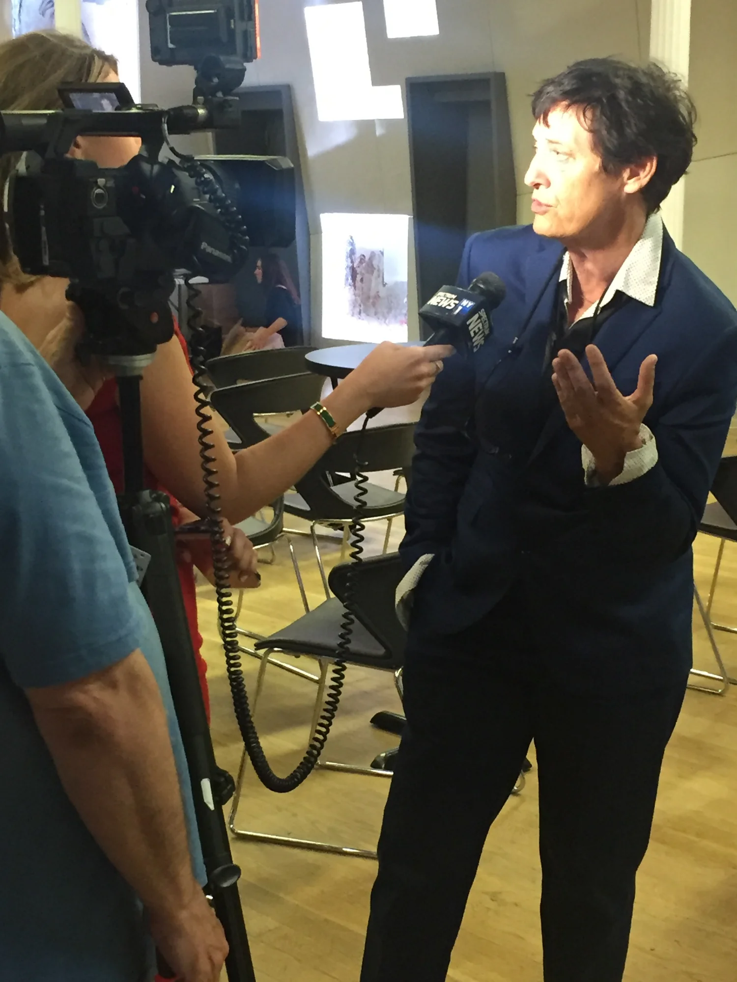 Anne-christine d’Adesky being interviewed at the Bodies on the Line kick-off event, New York City, 2017.