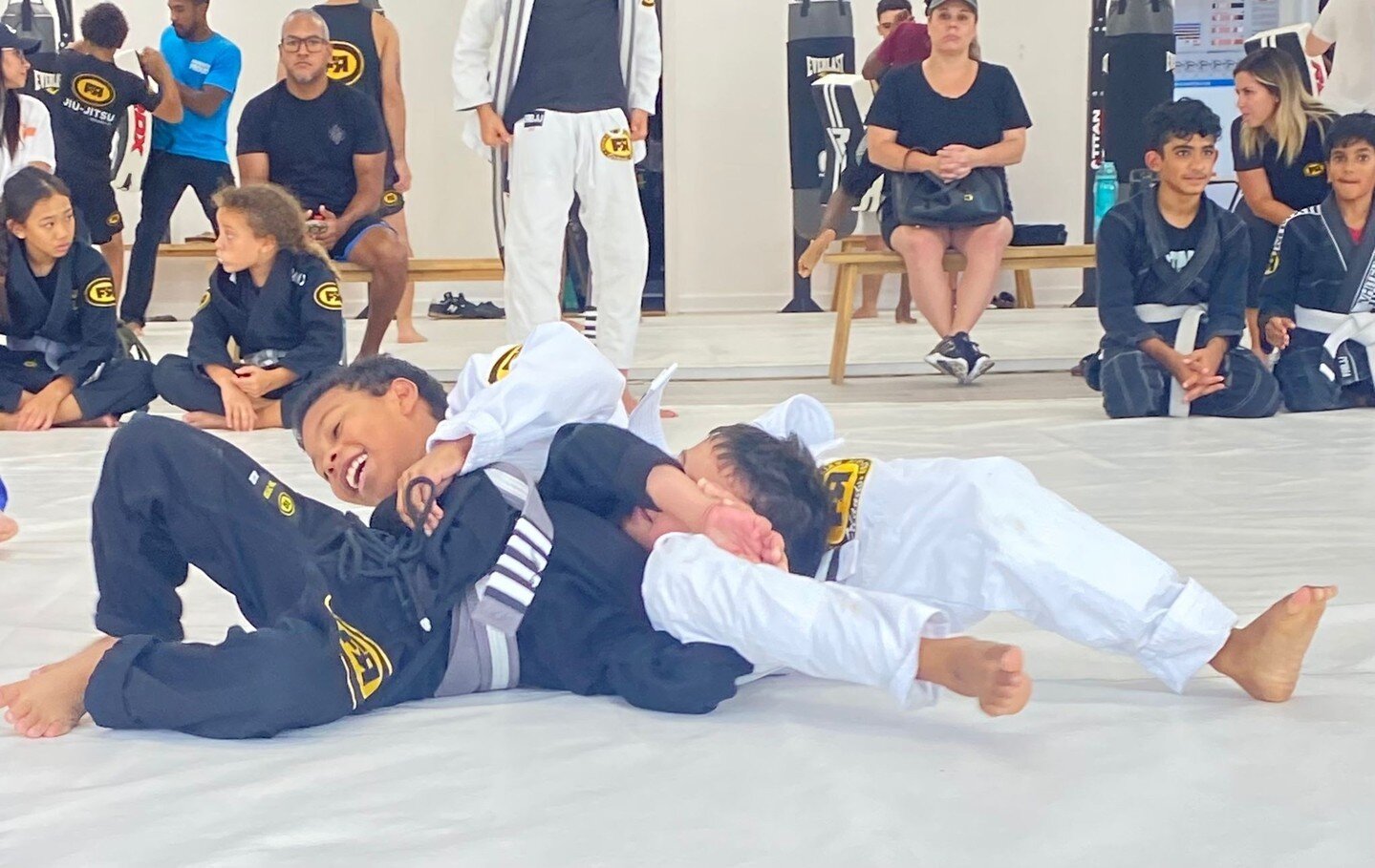 Looking to shake up your mundane fitness routines? Brazilian Jiu-Jitsu is a form of self-defense based on takedowns, chokes, and joint locks to overcome a larger opponent. During Gi Jiu-Jitsu classes, you will learn from our coaches how and where to 