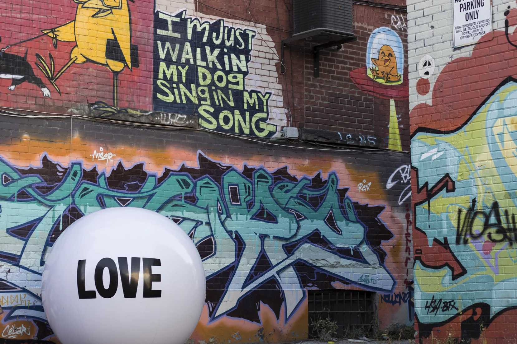 It’s hard not to stop and stare at the amazing work hidden in every crevice of Graffiti Alley. Keep an eye out for Uber5000’s little yellow birds, we love them.