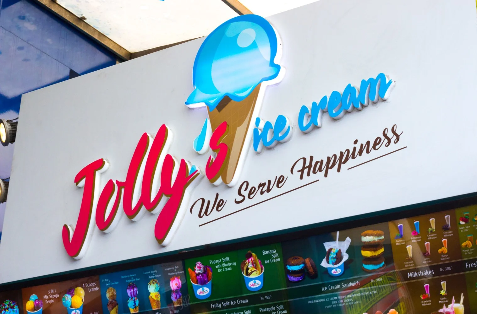 The colourful Jolly’s Ice Cream sign sits over the small shipping container storefront in Colombo, Sri Lanka.