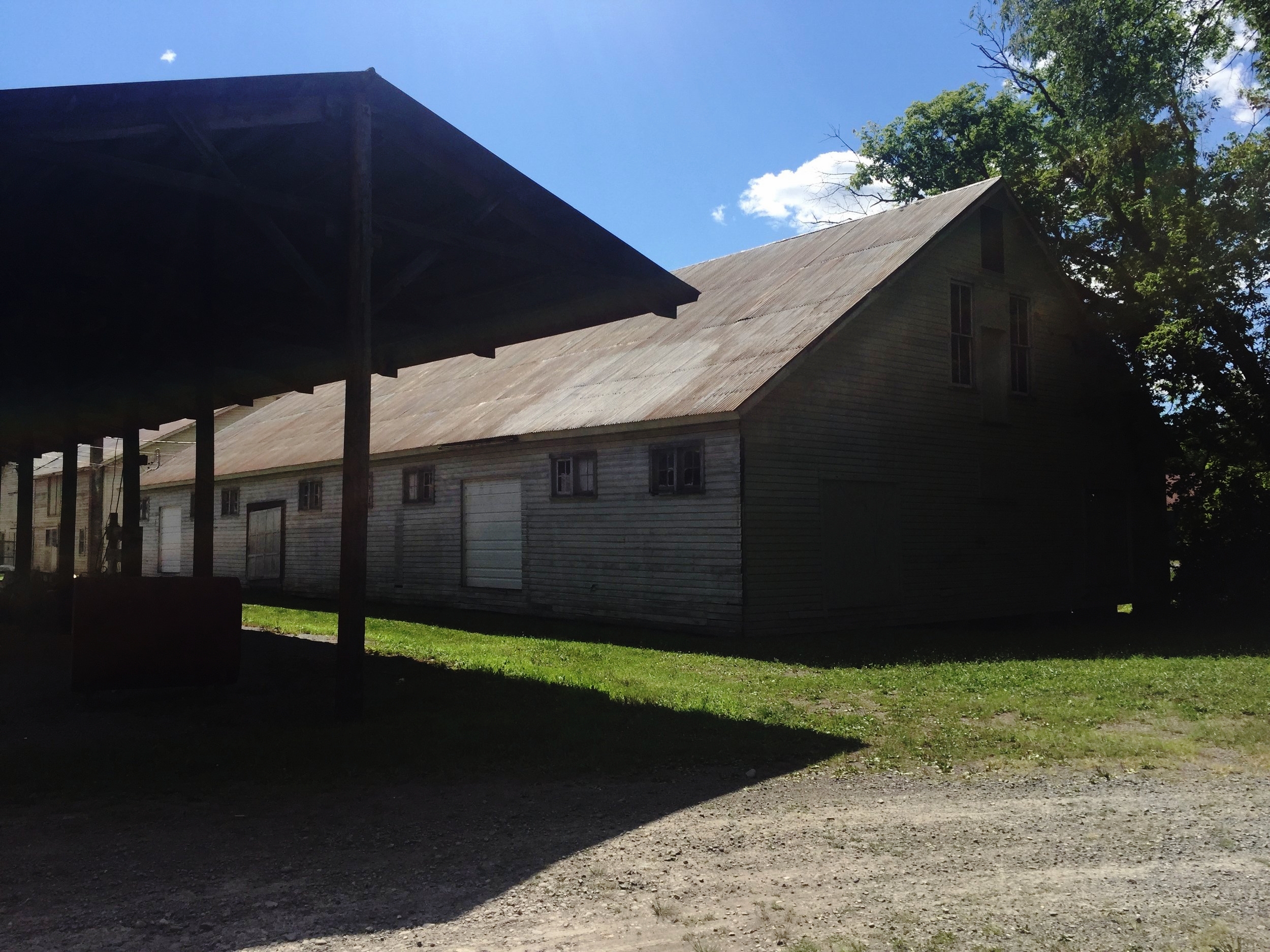 8000 square foot barn is home to the wood shop and open work area. Next to the barn is 3000 sqft covered work area.