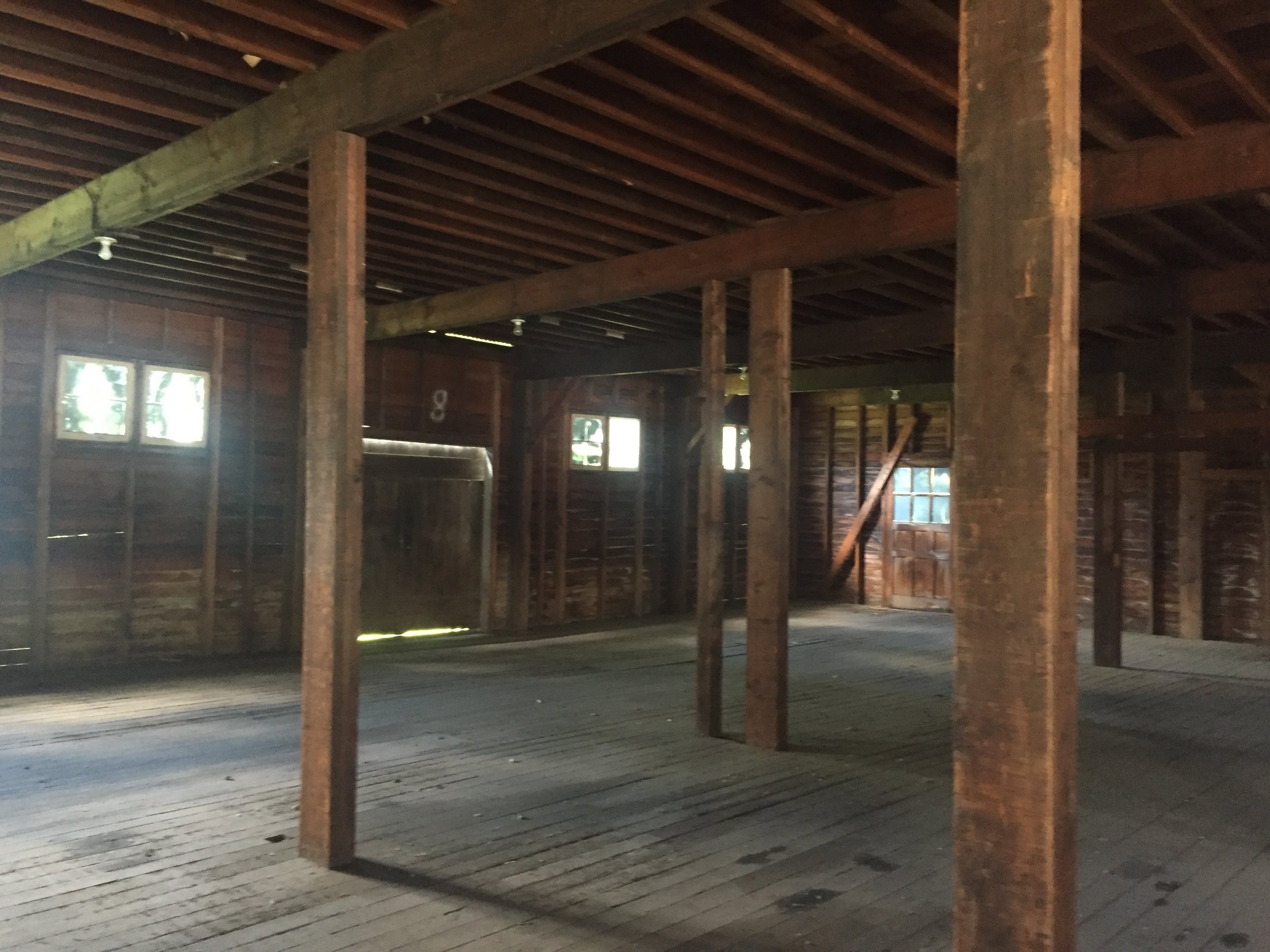 Large open work areas inside the barn. 