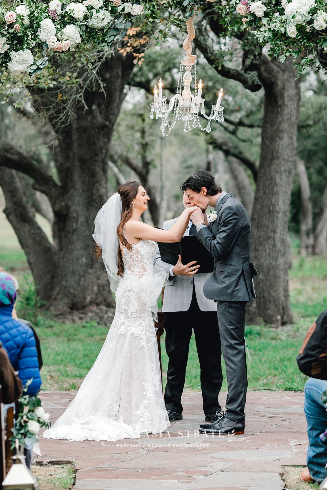  bride and groom during their greenery Austin wedding 