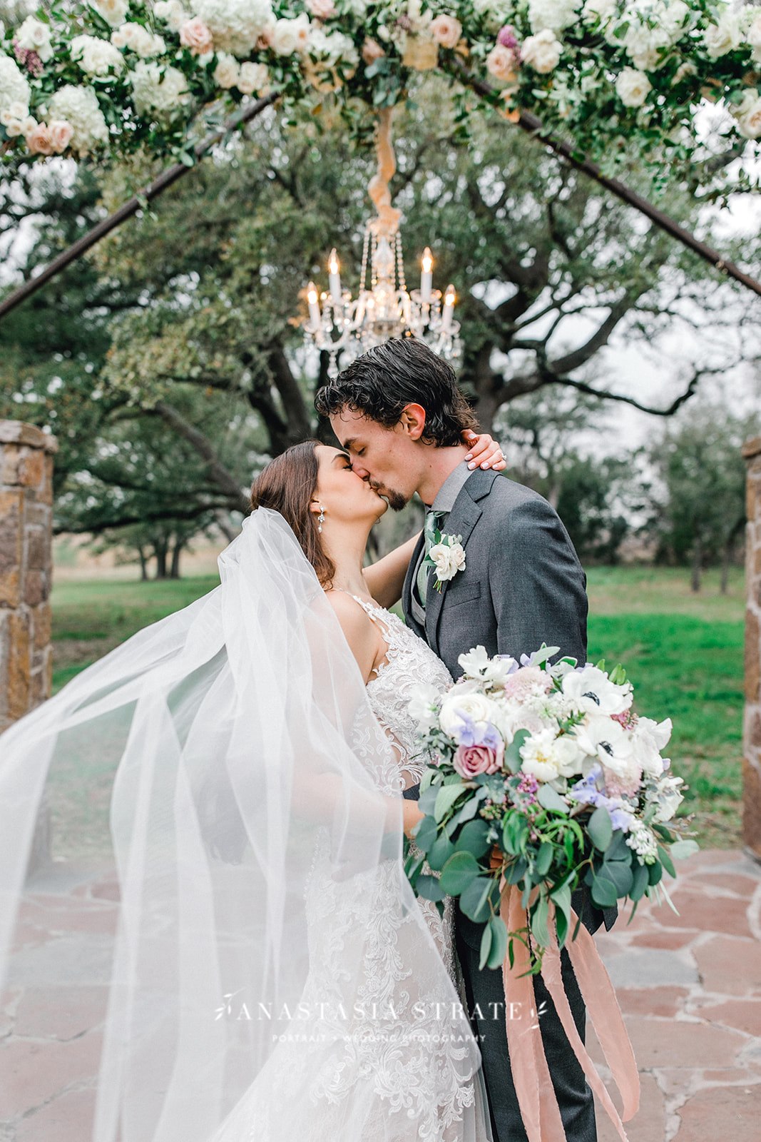  bride and groom kiss  