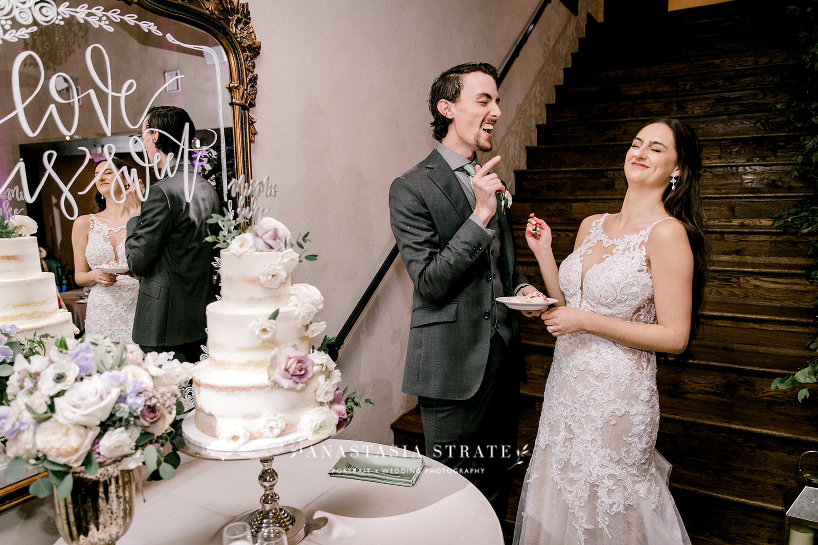  bride and groom cutting the wedding cake 