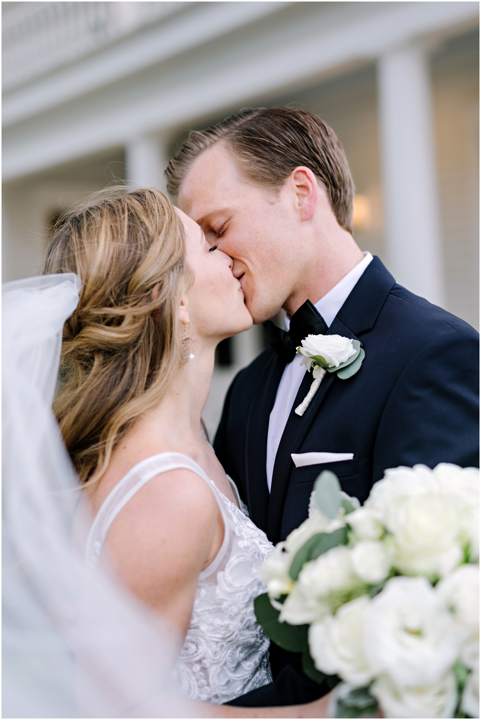  Bride and groom kiss  