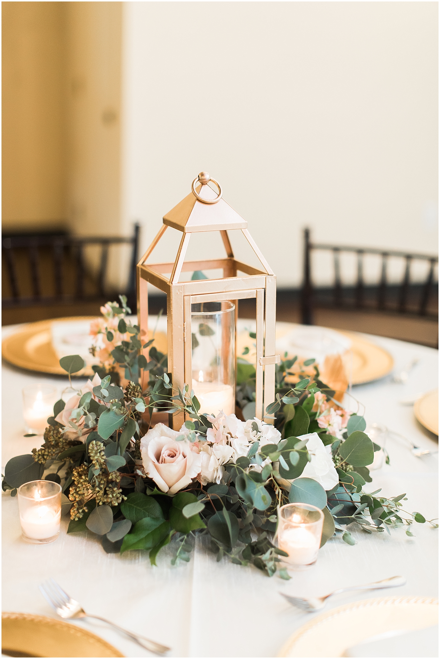 Lantern and floral wedding centerpiece