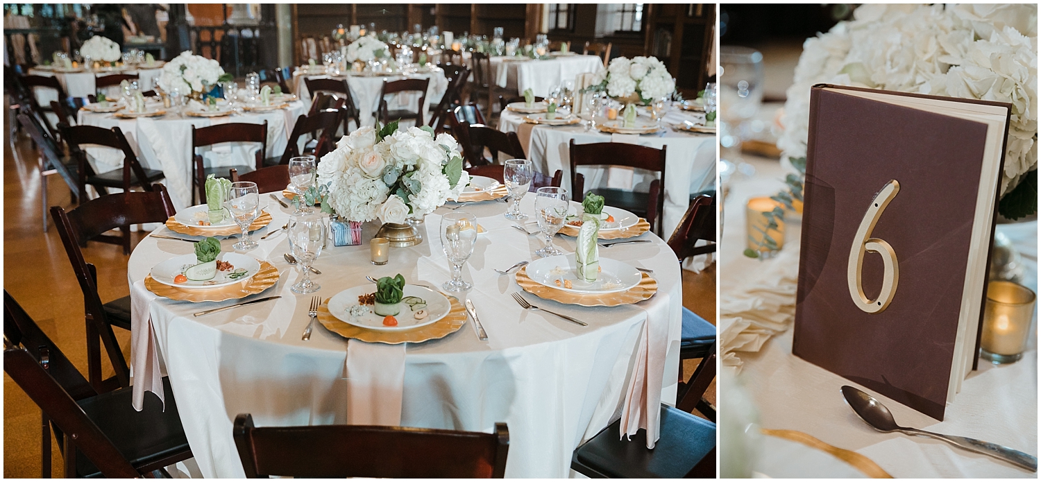 wedding table setting with gold chargers and books used for table numbers