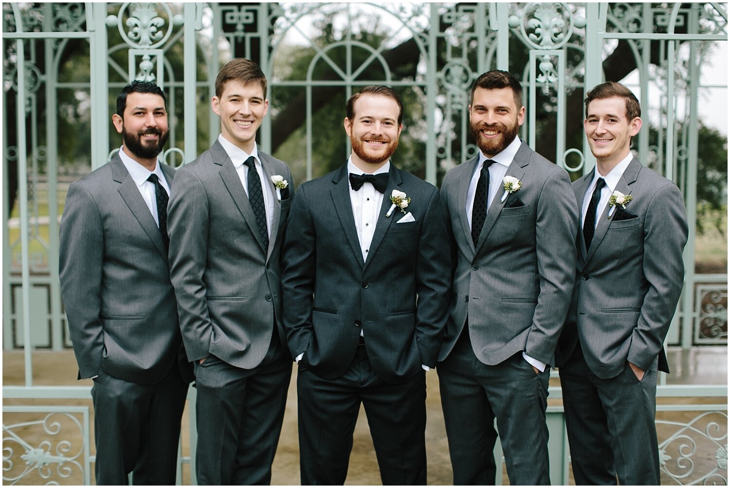  groom and groomsmen pose before the wedding 