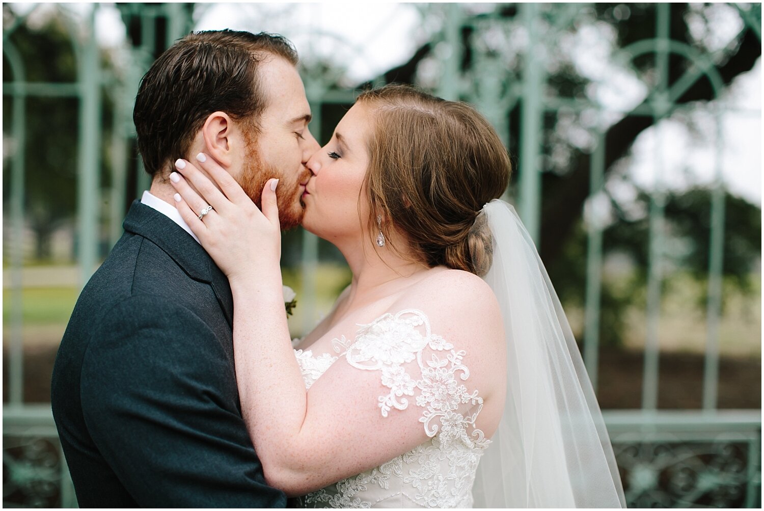  bride and groom kiss at their first look 