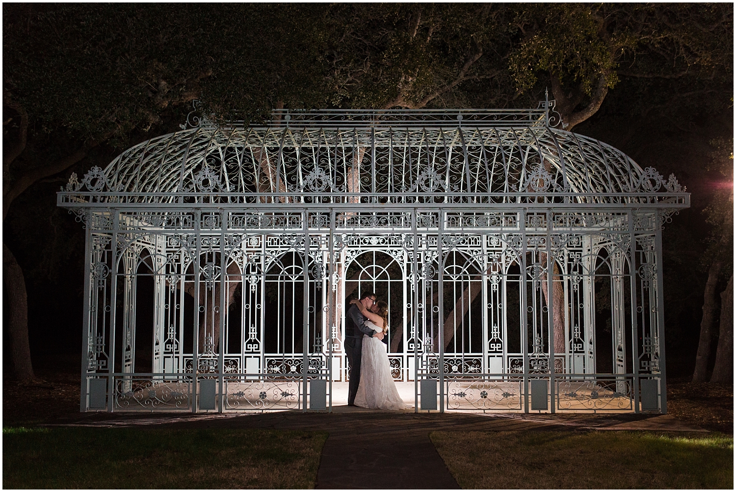  bride and groom kiss at their wedding in Austin 