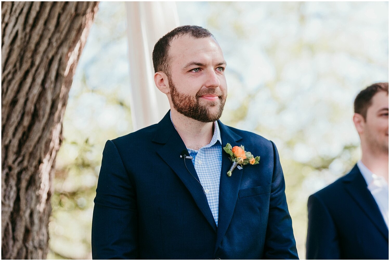  groom watching the bride walk down the aisle 